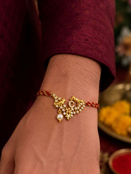 Digital Dress Room - C Letter Bird Pearl and Stone Design Rakhi