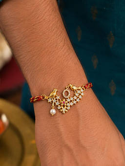 Digital Dress Room - O Letter Bird Pearl and Stone Design Rakhi