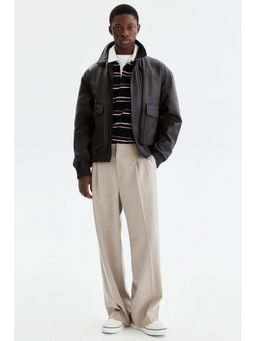 H&M - Men Beige Loose Fit Tailored Trousers