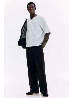 H&M - Men Black Relaxed Fit Twisted Trousers