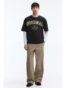 H&M - Men Green Relaxed Fit Twisted Trousers