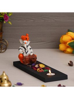 eCraftIndia - Ganesha Playing Tabla Showpiece with Rectangle Fragranced Petals & Tealight