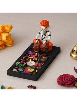 eCraftIndia - Ganesha Playing Tabla Showpiece with Rectangle Fragranced Petals & Tealight