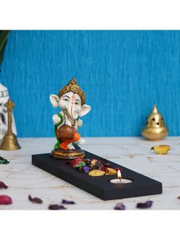 eCraftIndia - Baal Ganesha Playing Dholak Showpiece with Wooden Base, Petals & Tealight
