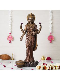 eCraftIndia - Handcrafted Goddess Lakshmi Idol Standing On Lotus Flower with Money Pot Statue