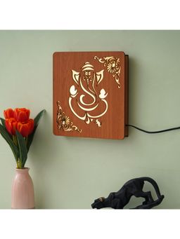 eCraftIndia - Brown Lord Ganesha Carved Decorative Wooden Wall Lamp