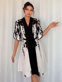 Outzidr - Black & White V-Neck Front Tie Knee Length Dress