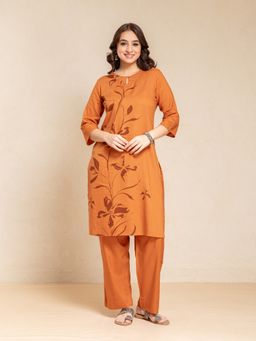 Suti - Women Rust Rayon Floral Kurta with Pant