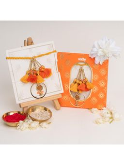 Salty - Orange Tassel and Enamel Lumba Bandhan Rakhi for Bhabhi