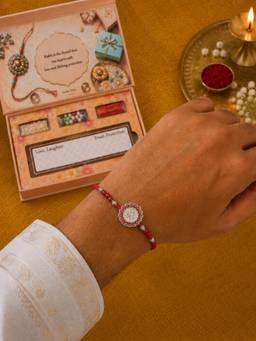 SAMIKA - 999 Pure Silver Shree Coin Rakhi Hamper with Mukhwas, Roli and Chawal