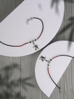 Priyaasi - Red Black Stones Studded Silver Plated Oxidized Anklets