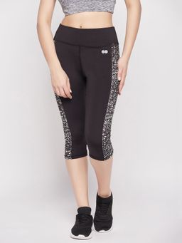Clovia - Snug Fit High-Rise Active Capri In Black With Marble Print Panels