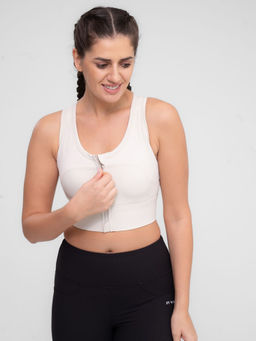 STRCH - Beige Solid Slim Fit Sleeveless Sports Bra