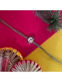 Digital Dress Room - Gold Plated Kundan Oval Shape Pendant Rakhi For Raksha Bandhan