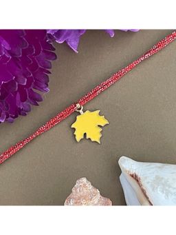 Digital Dress Room - Gold Plated Yellow Maple Leaf Charm Rakhi For Raksha Bandhan