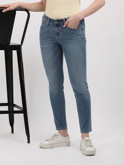 Calvin Klein - Light-Wash Slim Fit Mid Rise Blue Jeans