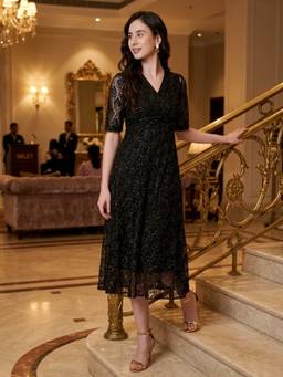 JUSTIN WHYTE - Stylish Black Textured Pleated Midi Dress