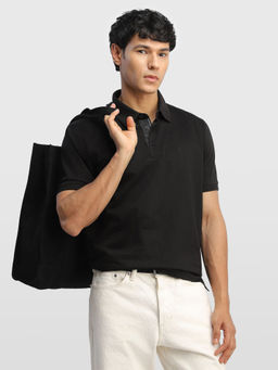 Arrow - Black Men Solid Glided Night Polo Shirt