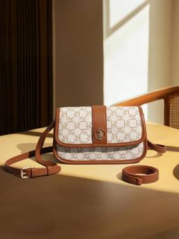 U.S. POLO ASSN. - Trinity Off White Monogram crossbody Handbag with Twist Closure