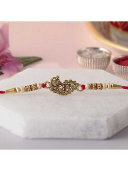 eCraftIndia - Golden & Red Beautiful Peacock Designer Rakhi for Brother with Roli Chawal