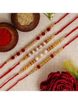 eCraftIndia - Red, Golden & White Beads, Pearl, Diamond Designer Rakhi's with Roli Chawal
