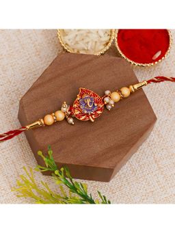 eCraftIndia - Golden, Red & Purple Lord Ganesha On Leaf Religious Rakhi for Brother with Roli Chawal