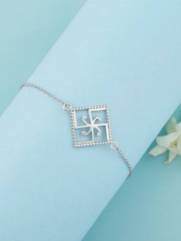Ornate Jewels - 925 Silver American Diamond Swastik Rakhi Bracelet for Brother with Roli Chawal