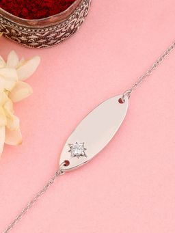 Ornate Jewels - 925 Silver American Diamond Star Rakhi Bracelet for Brother with Roli Chawal