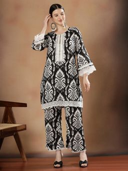 STYLEBAAZI - Women Pure Cotton Black Embroidered Kurta with Trouser