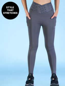 Kica - Mid Rise Criss Cross Leggings in Sculpting Stretch Kica SKN Fabric Grey
