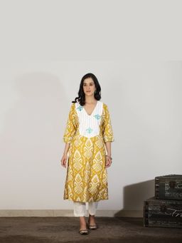 Spring Soul - Women Yellow Ikat Kurta with Embroidered Yoke