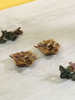 AAPNO RAJASTHAN - Lord Ganesha on Leaf with Diya Set of Two