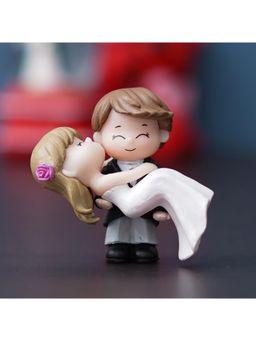 eCraftIndia - Polyresin Handcrafted Bride Kissing Groom Romantic Couple Statue Decorative Showpiece