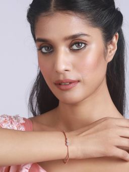 Aatmana - Rose Gold Plated American Diamond Studded Round Pattern Sleek Bracelet