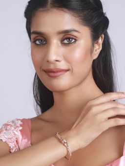 Aatmana - Rose Gold Plated American Diamond Studded Round Shaped Elegant and Sleek Bracelet