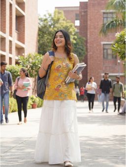 Tikhi Imli - Sleeveless Yellow Cotton Kurti with Layered Gotta Patti Skirt