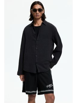 H&M - Men Black Loose Fit Printed Shorts