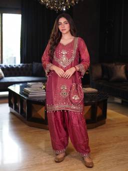 Autumnlane - Women Pink Embroidered Sequined Work Kurti with Salwar and Potli Bag