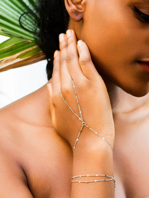 Niscka Gold Toned Stylish Hand Harness Hand Chain