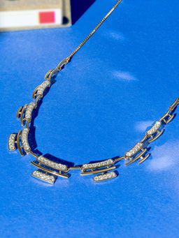 Mia by Tanishq - Flash Weave Gold and Diamond Nose Pin