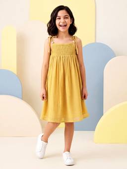 PURVAJA JUNIOR - Girls Fit and Flare Knee Length Sleeveless Tie Up Neck Textured Dress
