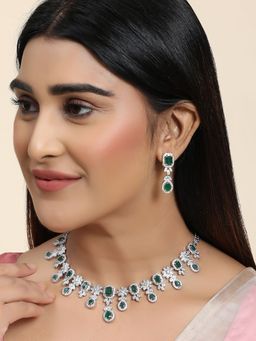 Anika's Creations - Silver Plated Ad & Emerald Green Stone Studded Jewellery Set