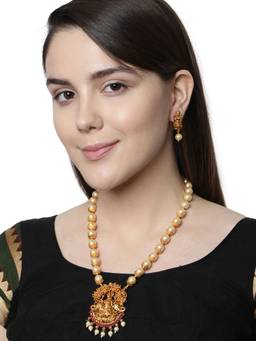 Anika's Creations - Antique Matte Gold Finish Goddess Laxmi Red Stone Studded Temple Jewellery Set
