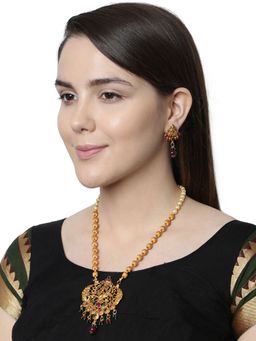 Anika's Creations - Antique Matte Gold Finish Green Stone Studded Temple Jewellery Set