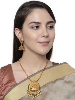 Anika's Creations - Antique Matte Gold Finish Goddess Laxmi Green Stone Studded Temple Jewellery Set
