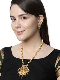 Anika's Creations - Antique Matte Gold Finish Green Stone Studded Temple Jewellery Set