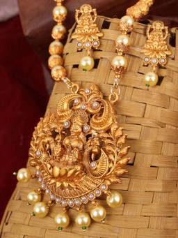 Anika's Creations - Antique Matte Gold Finish Stone Studded Temple Jewellery Set