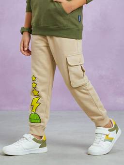 KiddoPanti - Boys Beige Star Lightning Graphic Printed Joggers