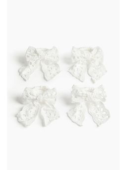 H&M - White 4-pack broderie anglaise napkin rings