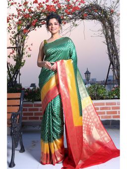 CHARUKRITI - Bottle Green Brocade Silk Saree with Zari Weaving and Unstitched Blouse